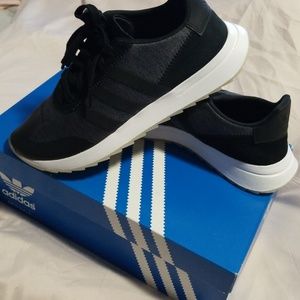 Black Adidas sneakers